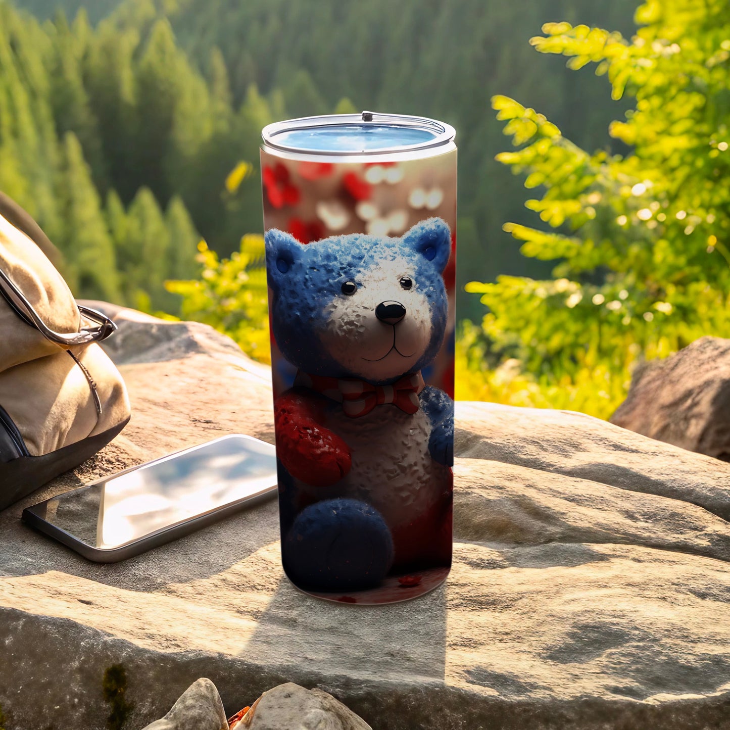 Blue and red teddy bear patriotic design on a stainless steel tumbler.