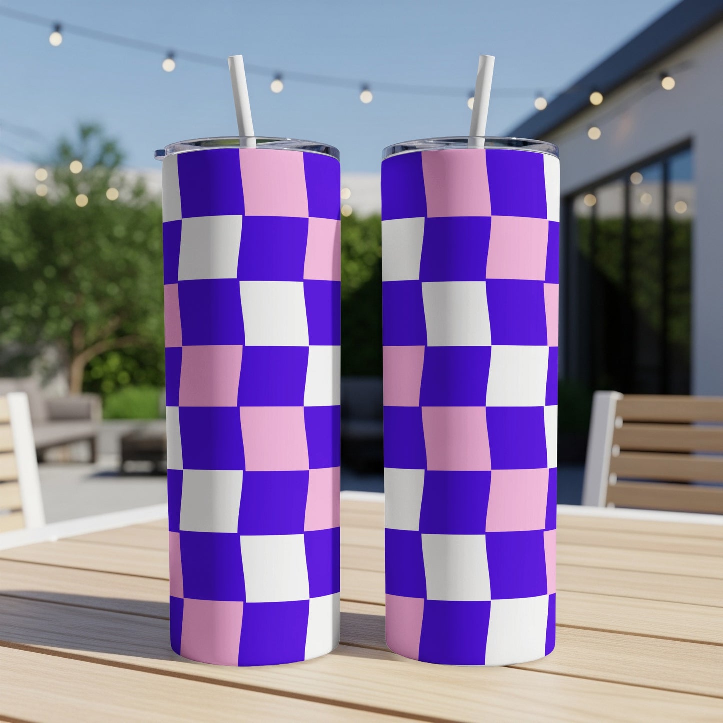 Two tall tumblers with a pink and purple checkerboard pattern.