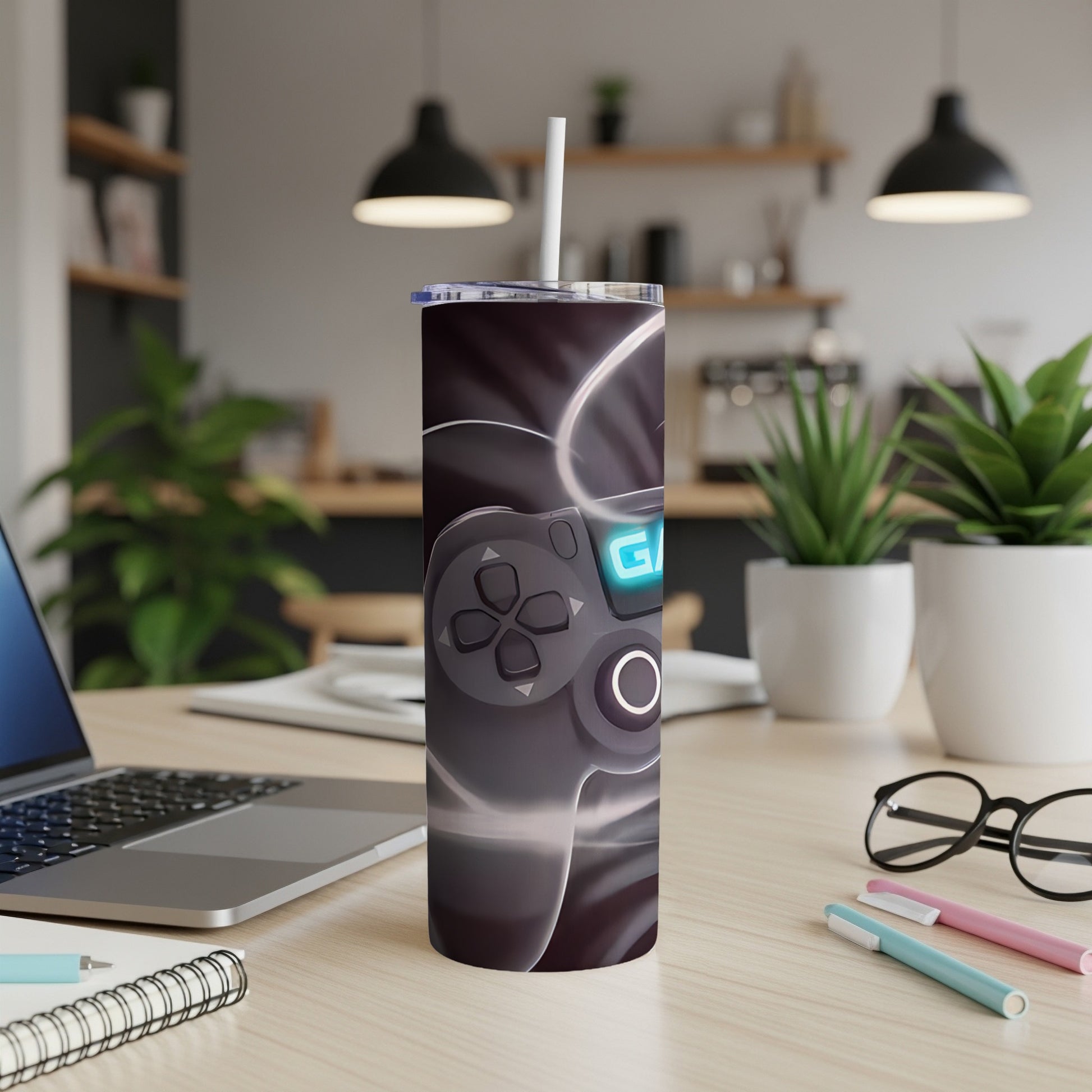 Tumbler with a video game controller design and "GO" text.