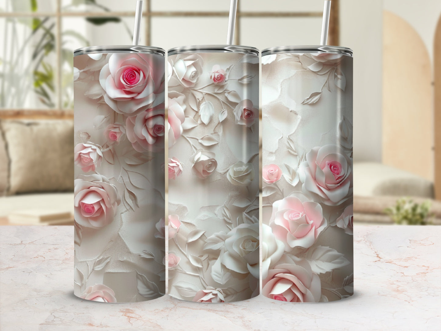 Three tumblers with pink and white roses on a textured background.