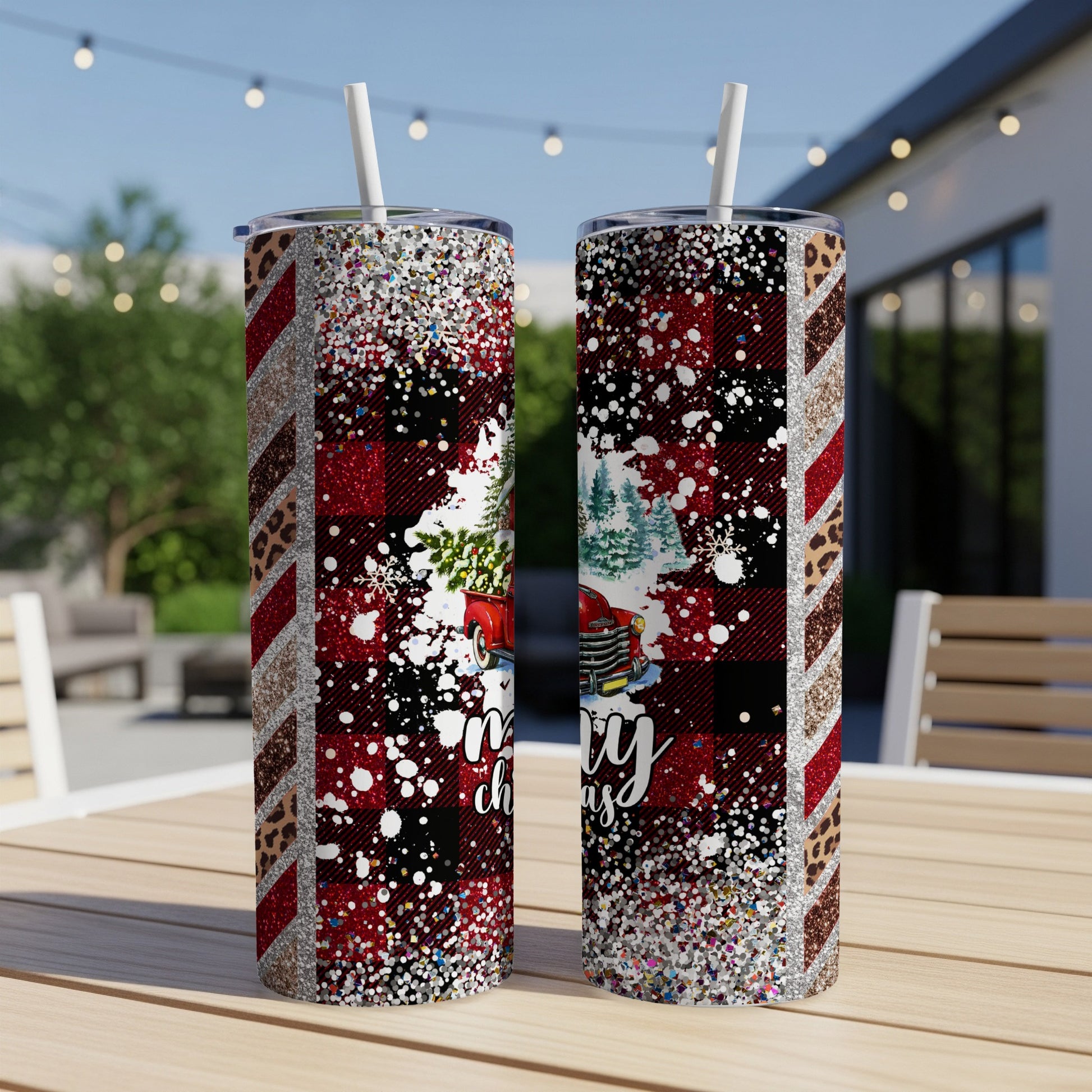 Two insulated tumblers with buffalo plaid, glitter, and festive Christmas truck graphics.