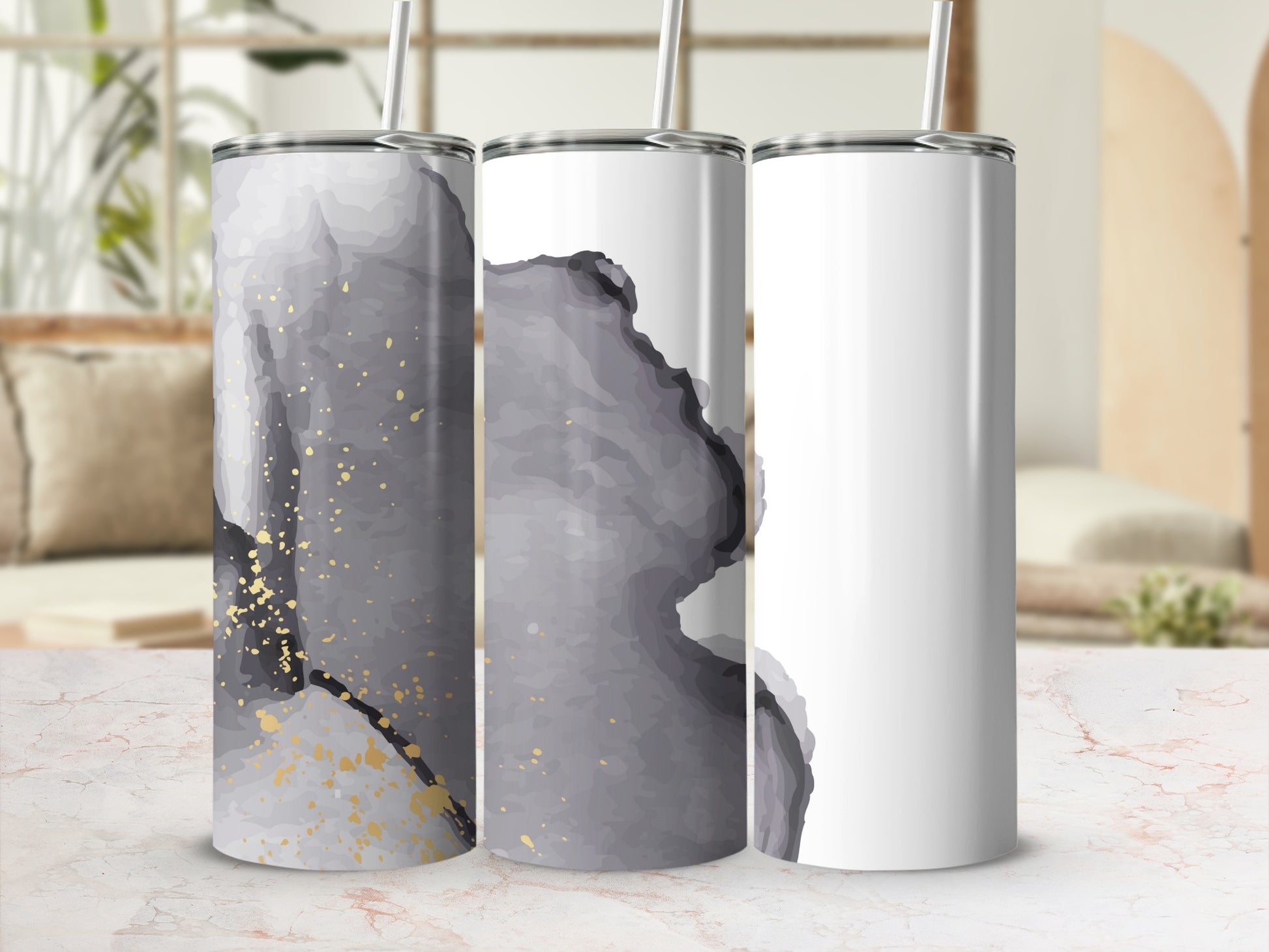Three tumblers with grey watercolor and gold splatter designs.