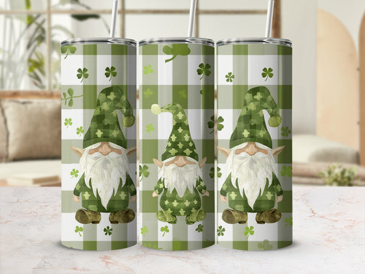 Three St. Patrick's Day gnomes with shamrocks on a green plaid tumbler.