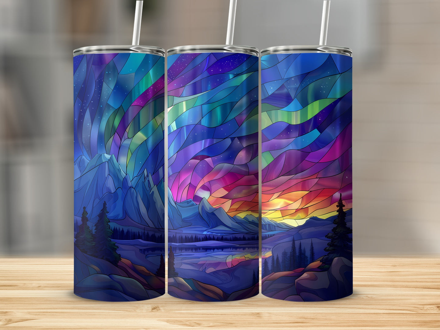 Three tumblers with stained-glass aurora borealis landscape designs.
