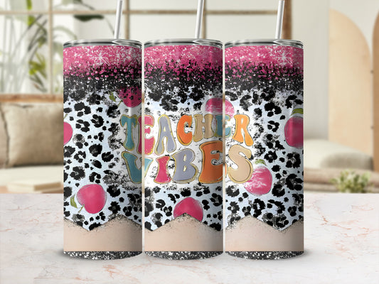 Tumbler with "Teacher Vibes" text, leopard print, and peach graphics.