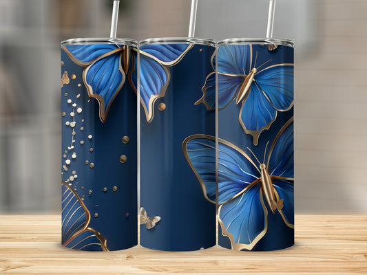 Three navy blue tumblers with golden butterflies and confetti designs.