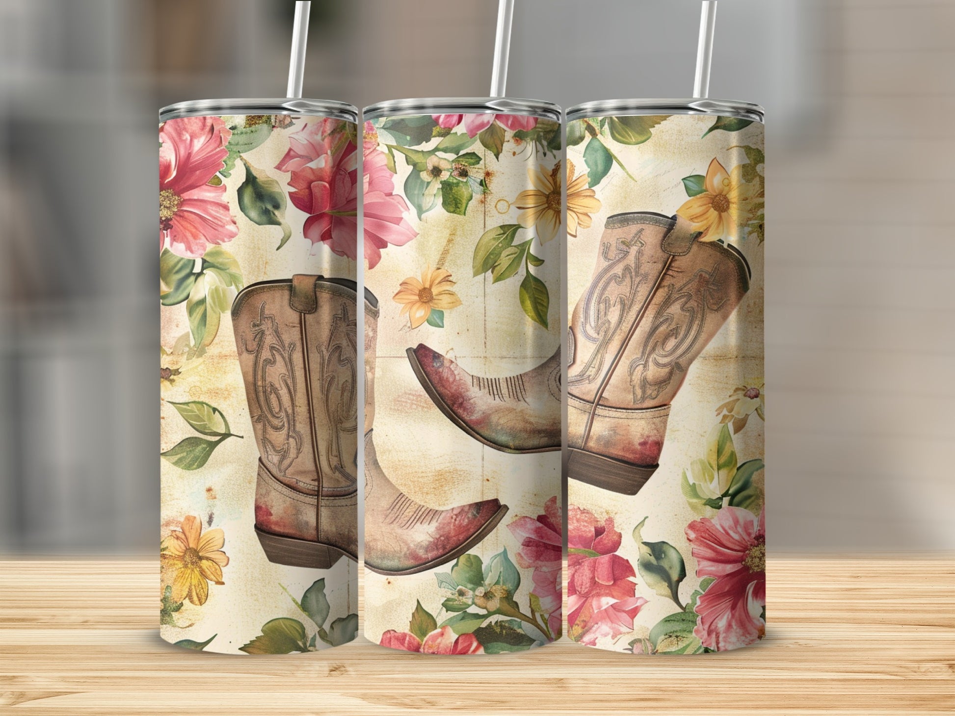 Three western boots on a floral background with straws.