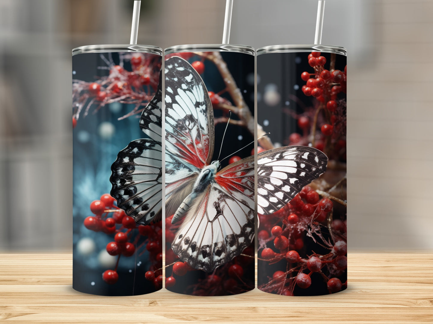 Three tumblers with a butterfly and red berries design.