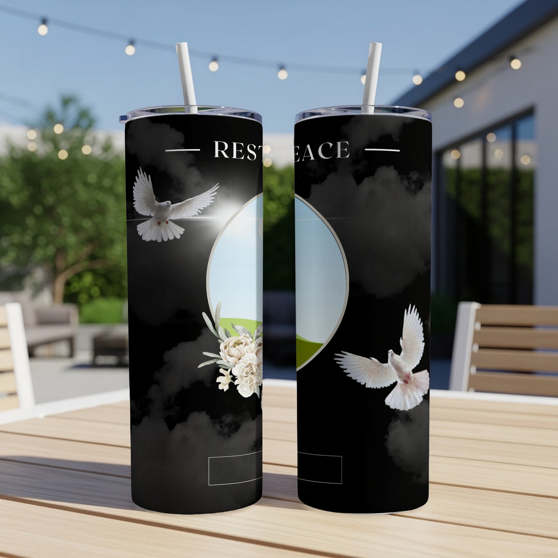 Two tumblers with "Rest in Peace" text, doves, and flowers on a black background.