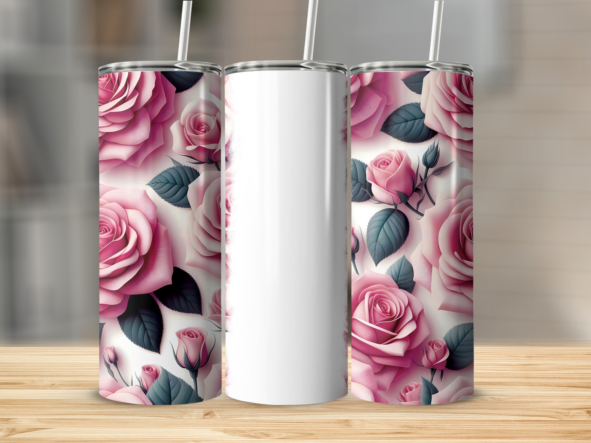 Two tumblers with pink roses pattern, one blank tumbler.