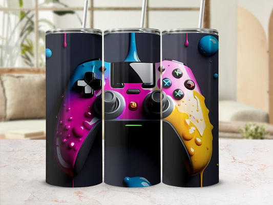 Three tumblers featuring a video game controller with pink, blue, and yellow paint drips.