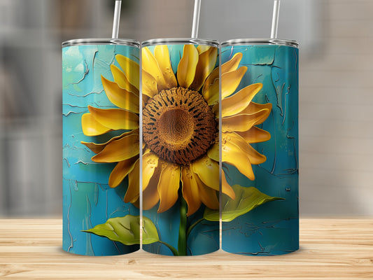 Three tumblers featuring a vibrant sunflower design on a textured blue background.