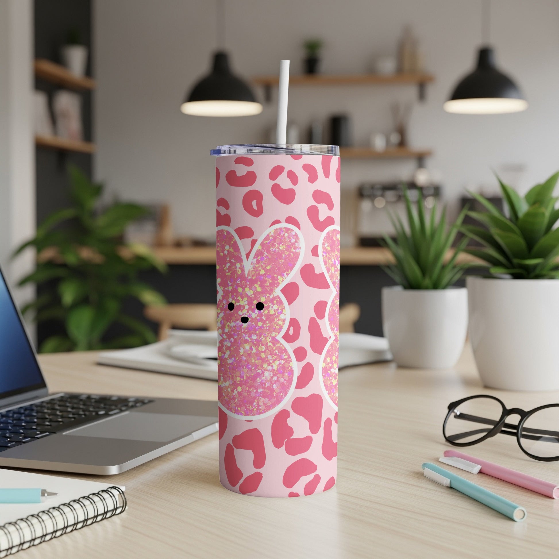 Pink bunny tumbler with leopard print and glitter accents.