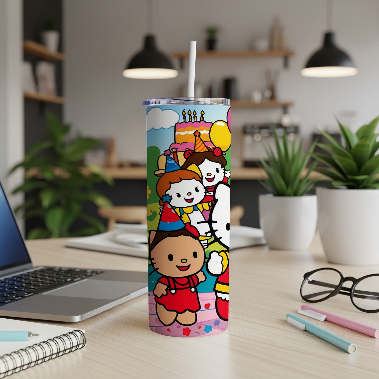 Kawaii characters in party hats celebrate on a blue tumbler with a straw.