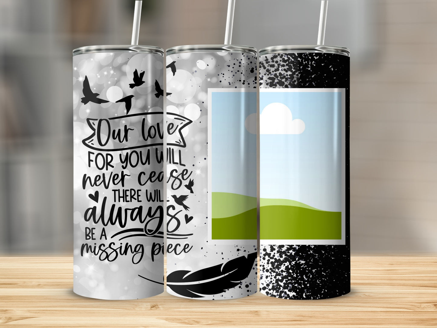 Three tumblers featuring black and white memorial designs with birds, a feather, and text.