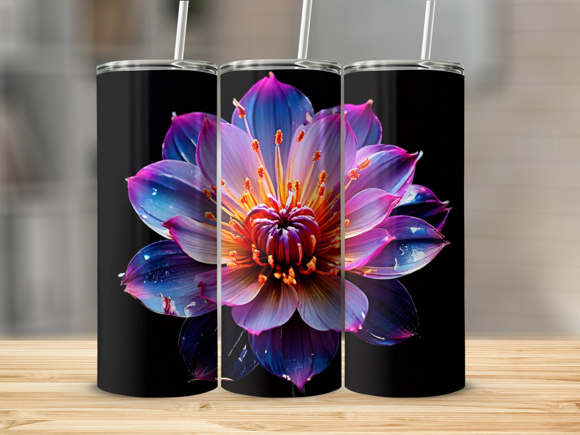 Floral tumbler with vibrant pink, purple, and blue petals on a black background.