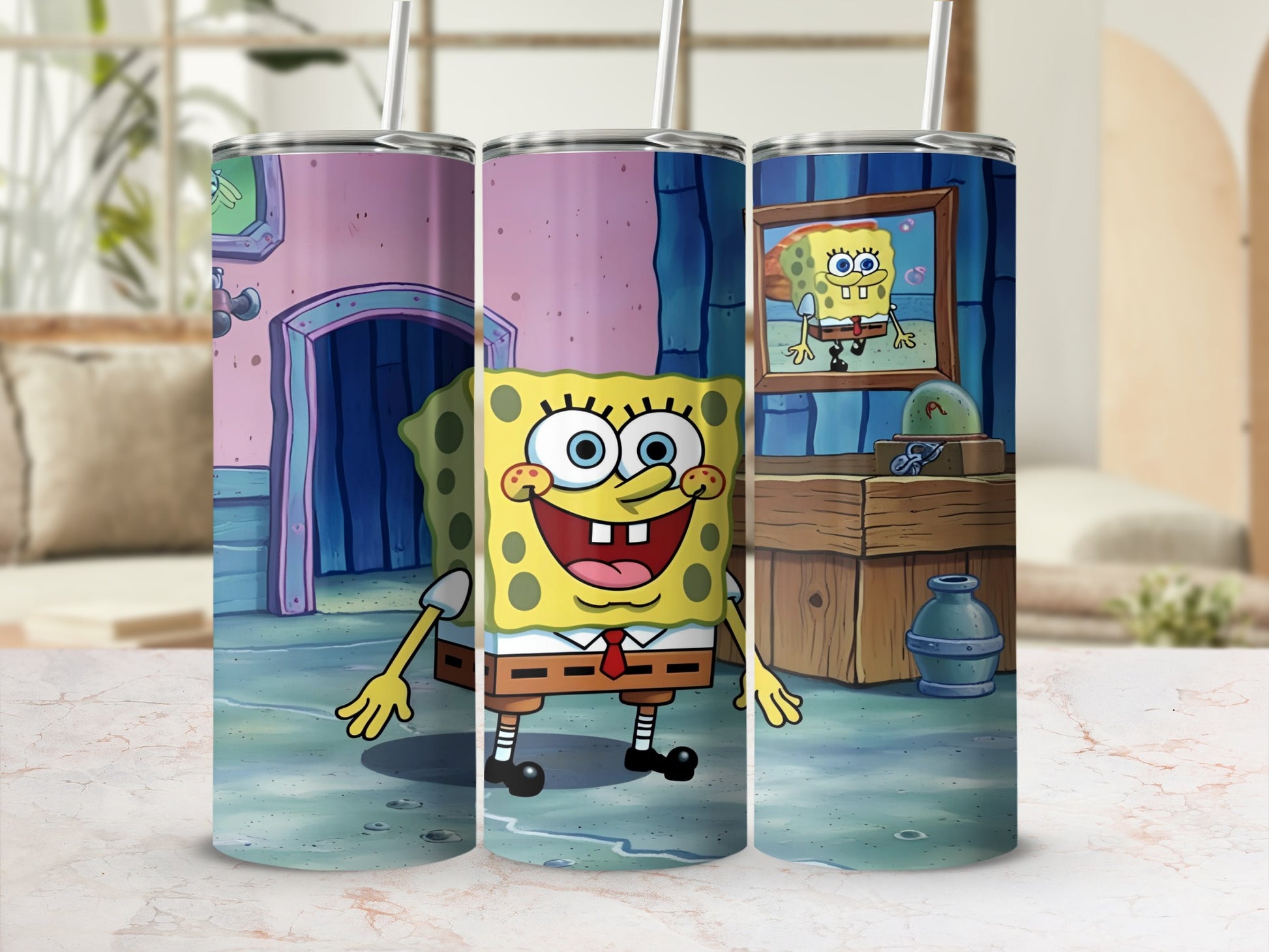 SpongeBob SquarePants artwork on three tumblers.