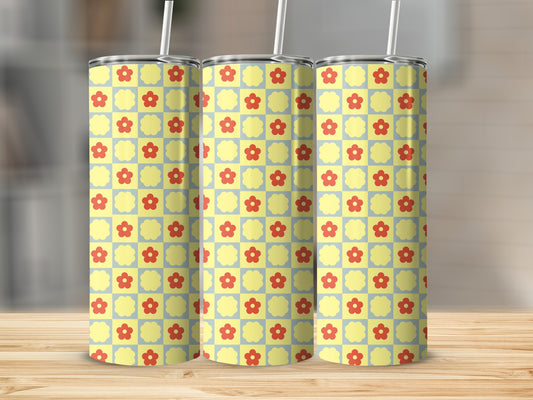 Yellow and light blue checkered pattern with red flowers on three tumblers.