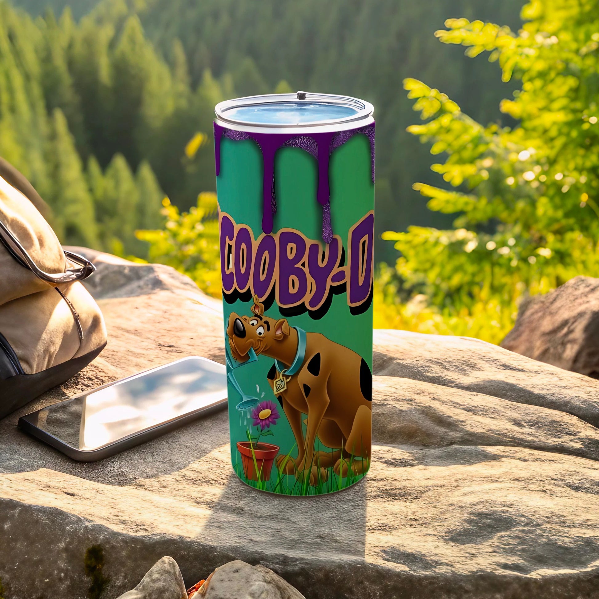 Scooby-Doo design on a green and purple dripping tumbler with Scooby watering a flower.