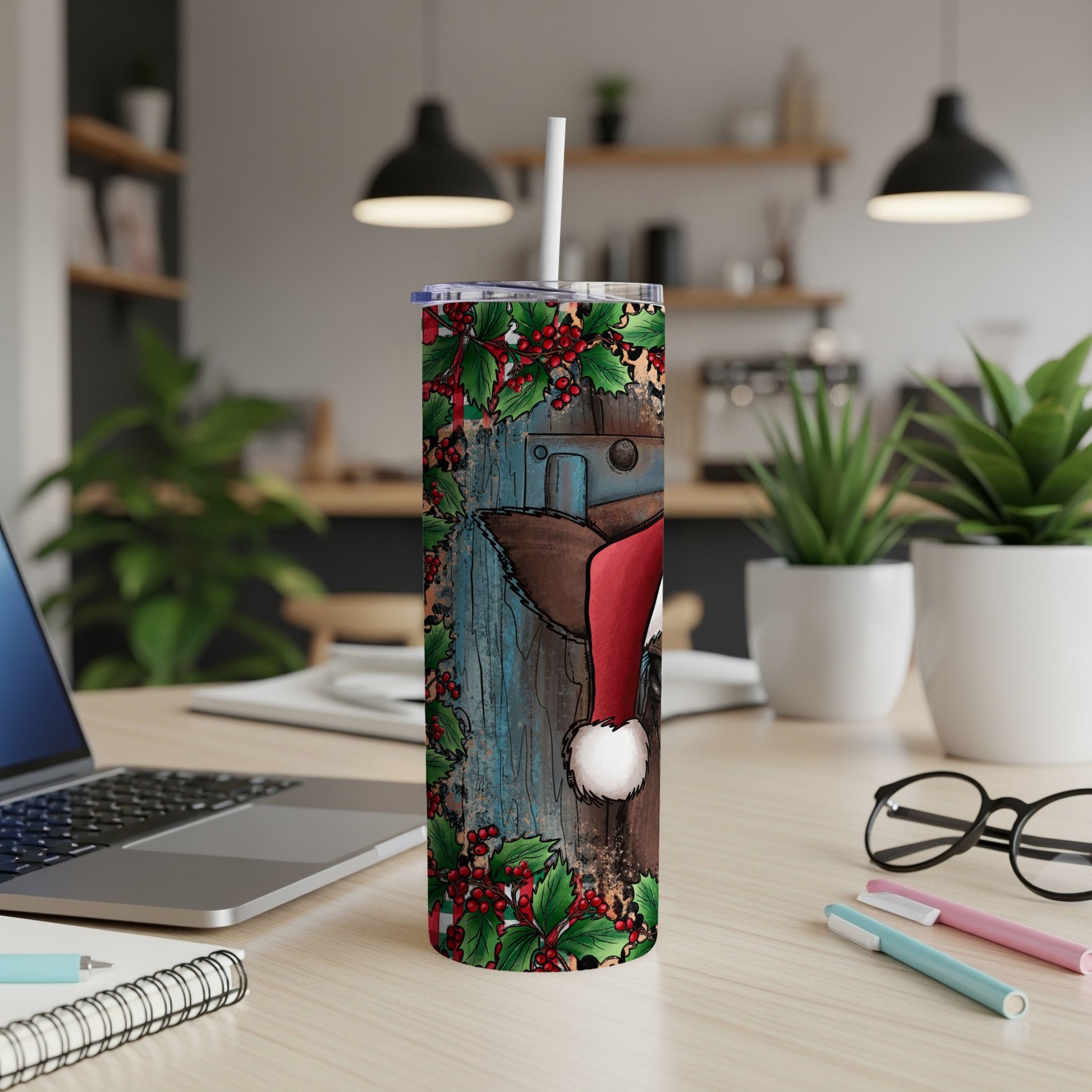 Christmas Santa hat tumbler with holly berries and rustic wood background.