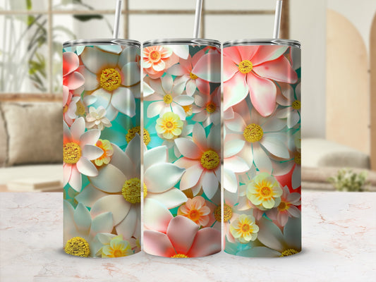Three tumblers with a vibrant floral pattern featuring pink and white flowers.