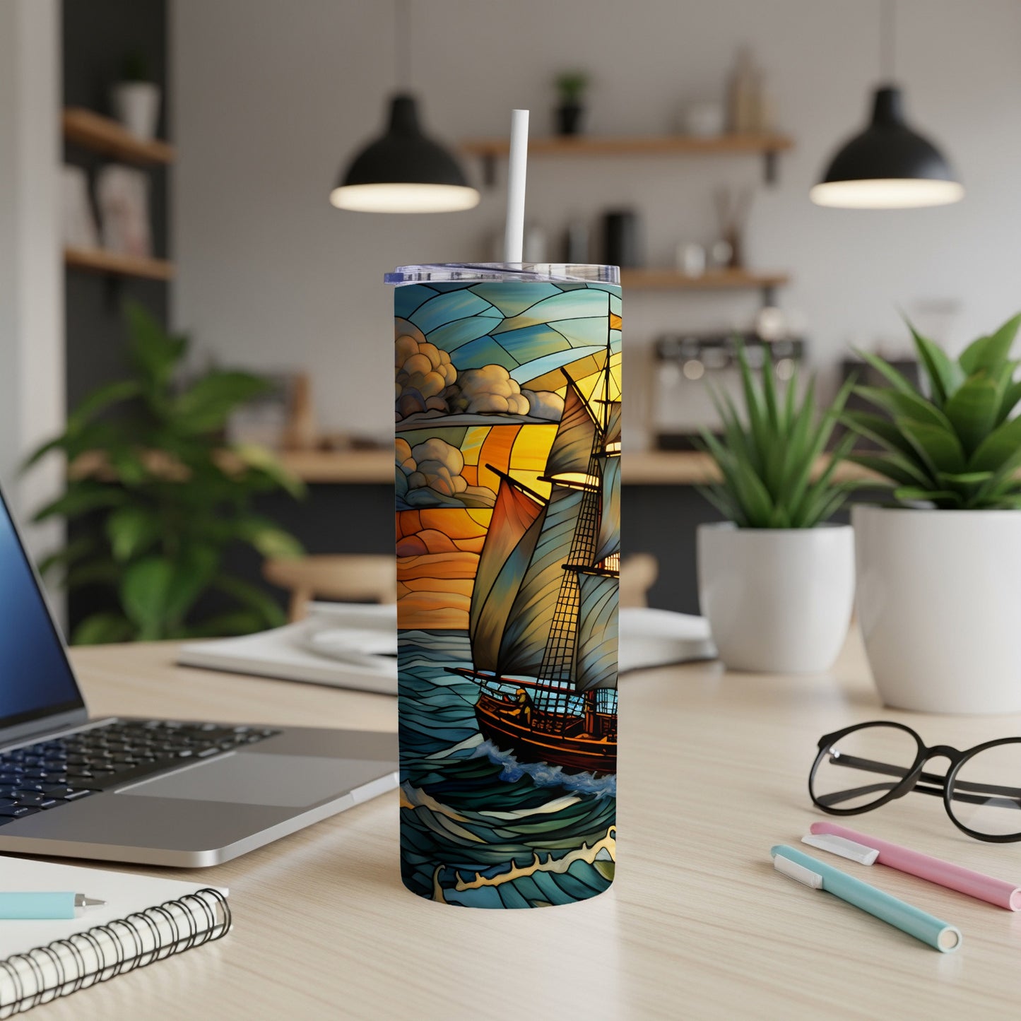 Sailboat with stained glass pattern on a tumbler with a straw.