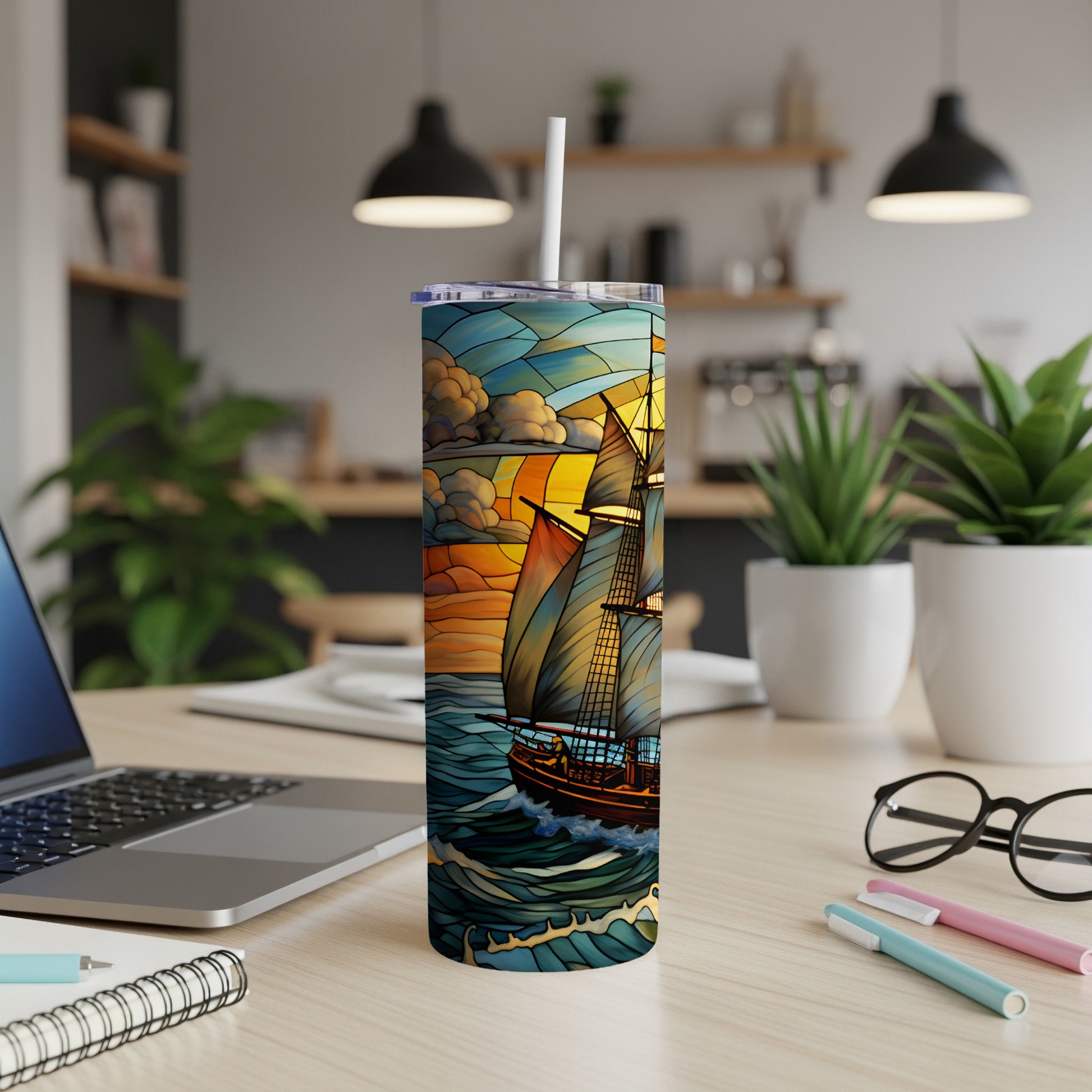 Sailboat with stained glass pattern on a tumbler with a straw.