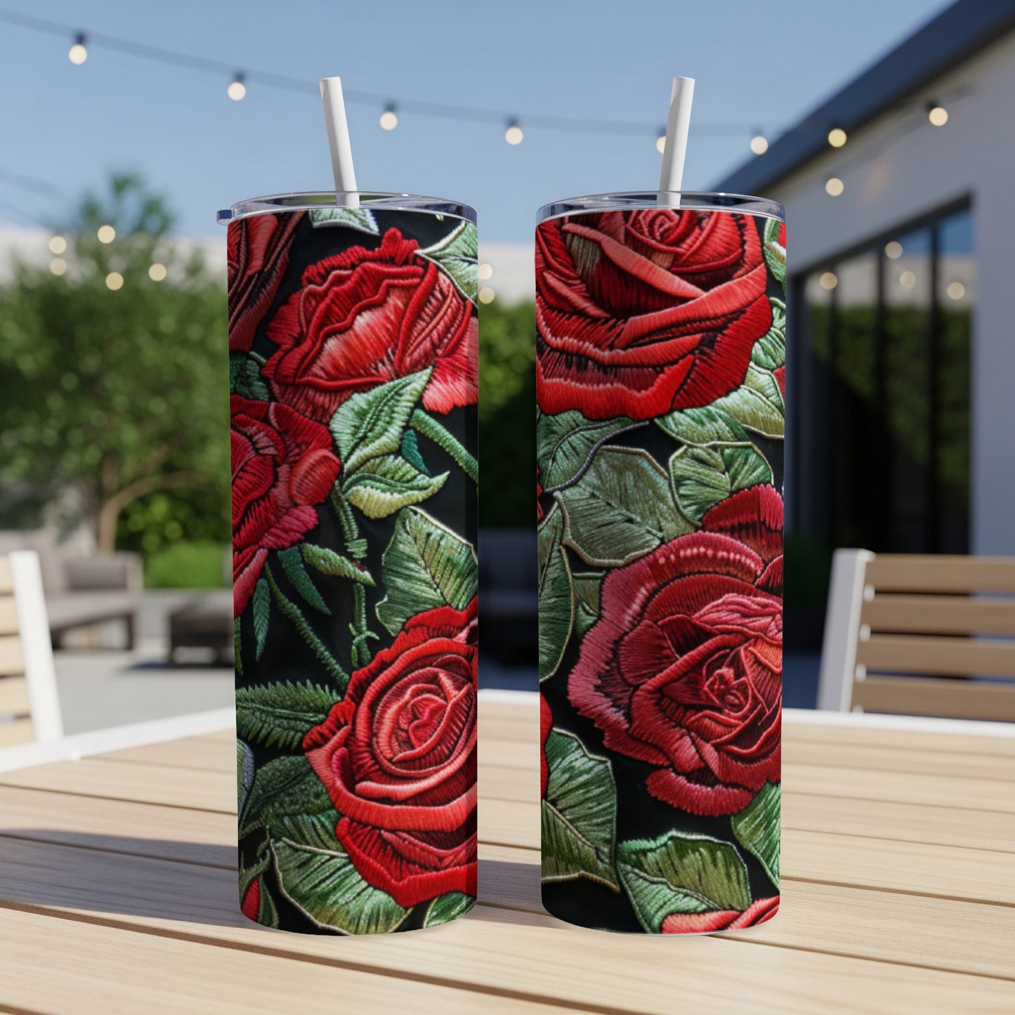 Two tumblers with red rose embroidery pattern.