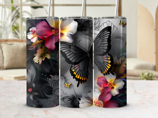 Tumbler with floral and butterfly design.
