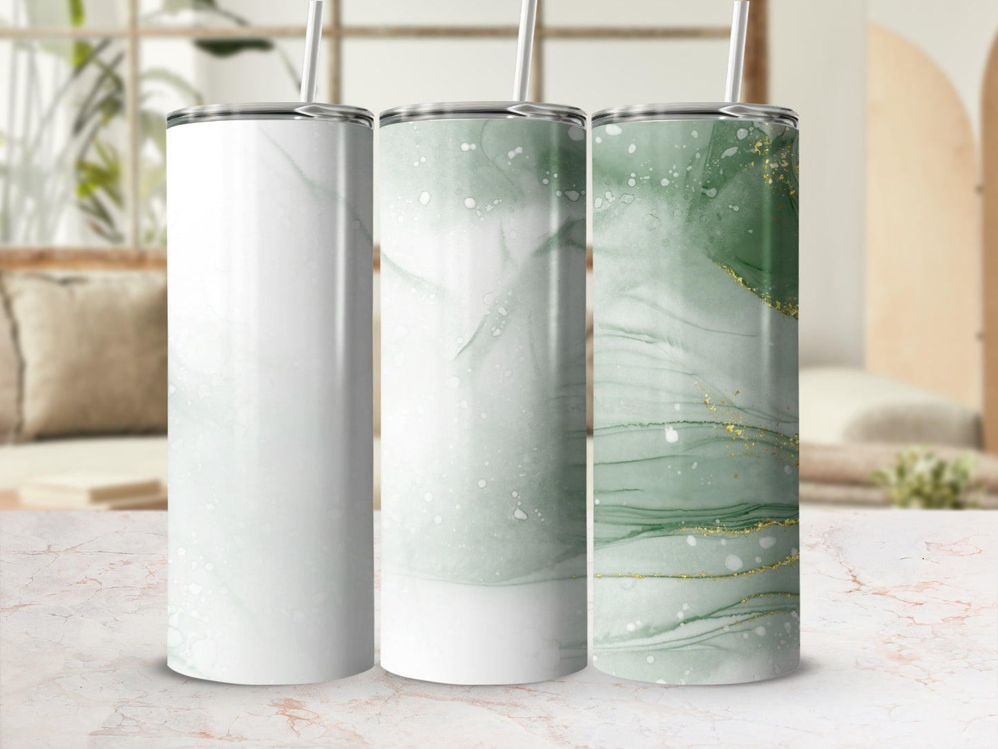 Three tumblers with green and gold marbled abstract designs.