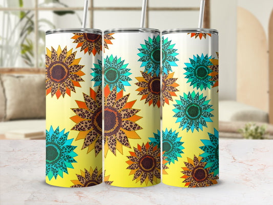 Three stainless steel tumblers with sunflower leopard print designs.