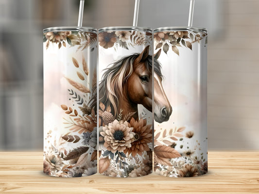 Horse and floral design on three tumblers with straws.