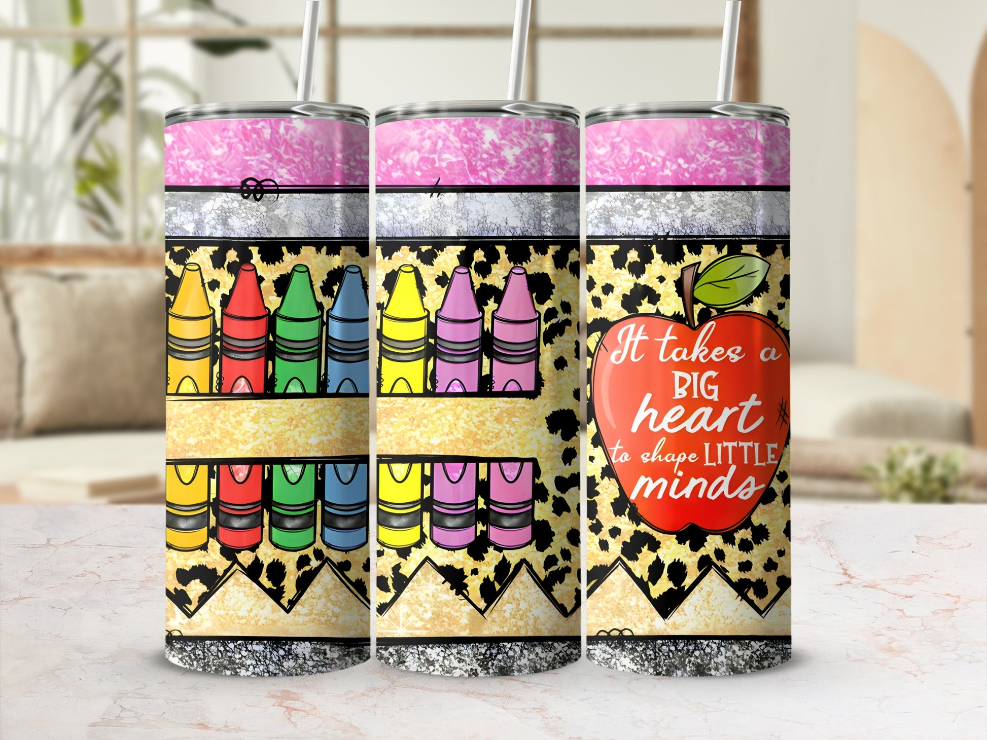 Tumbler with crayons and "It takes a big heart to shape little minds" quote.