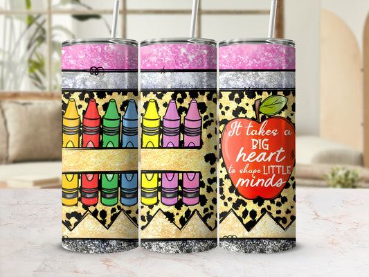 Tumbler with crayons and "It takes a big heart to shape little minds" quote.