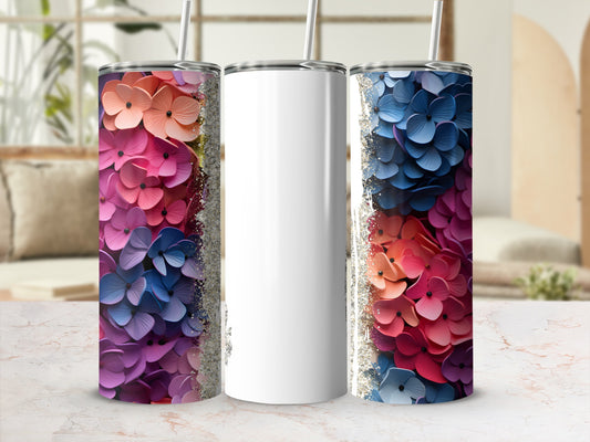 Tall white tumbler with colorful hydrangea floral design and silver glitter.
