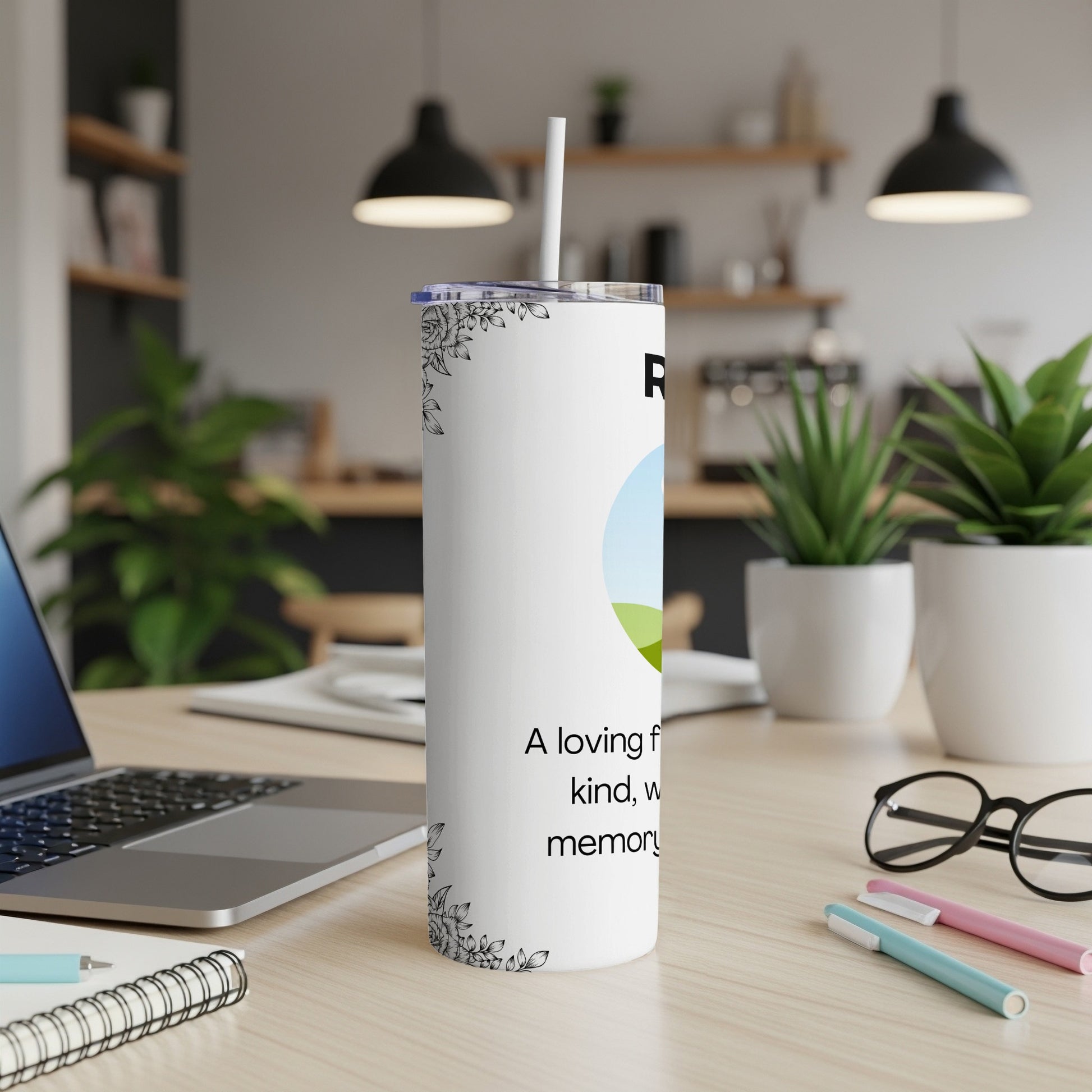 White tumbler with floral accents and text "A loving family, kind, warm memory".