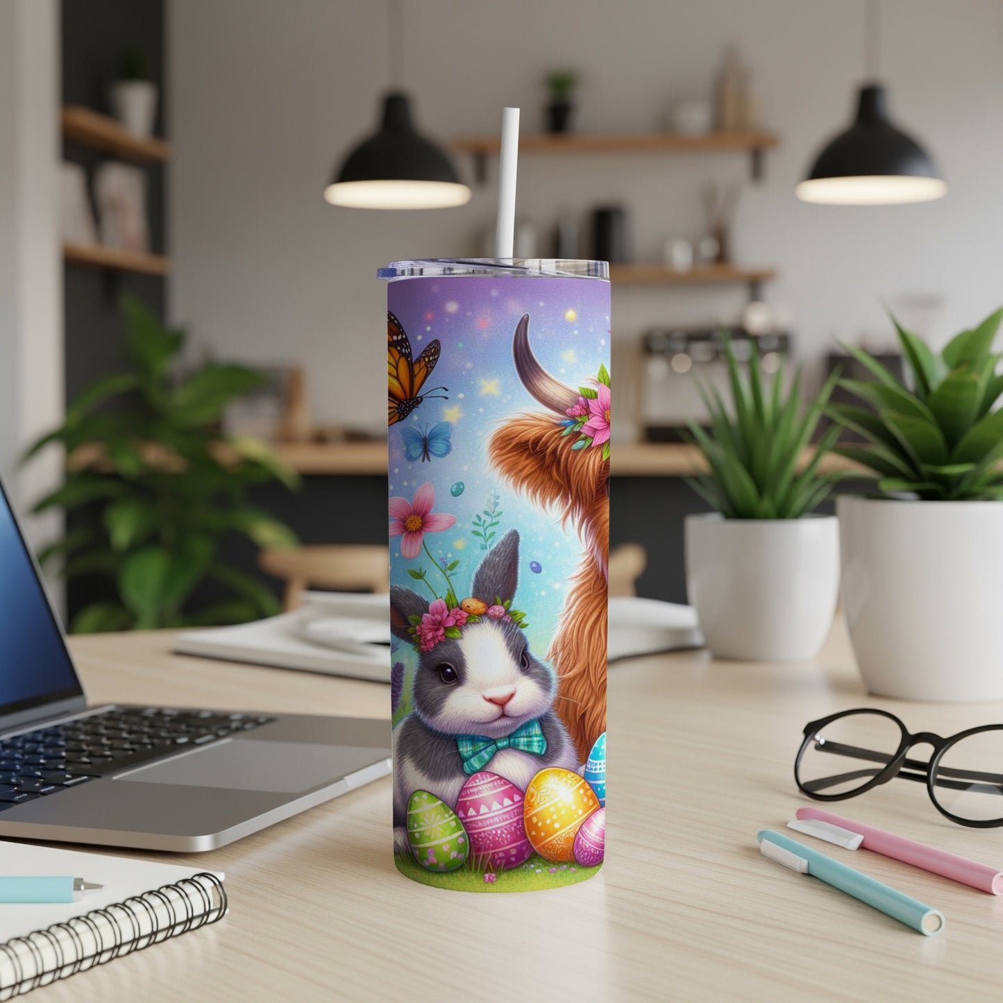 Easter bunny and Highland cow with colorful eggs and butterflies on a tumbler.