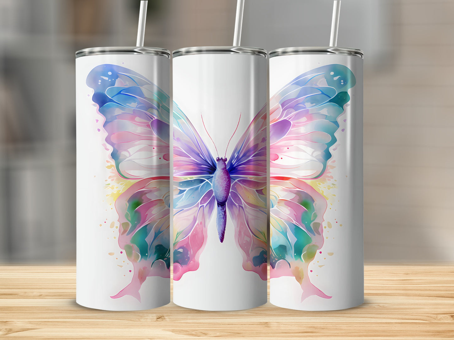 White tumbler with a watercolor butterfly design in pastel shades.