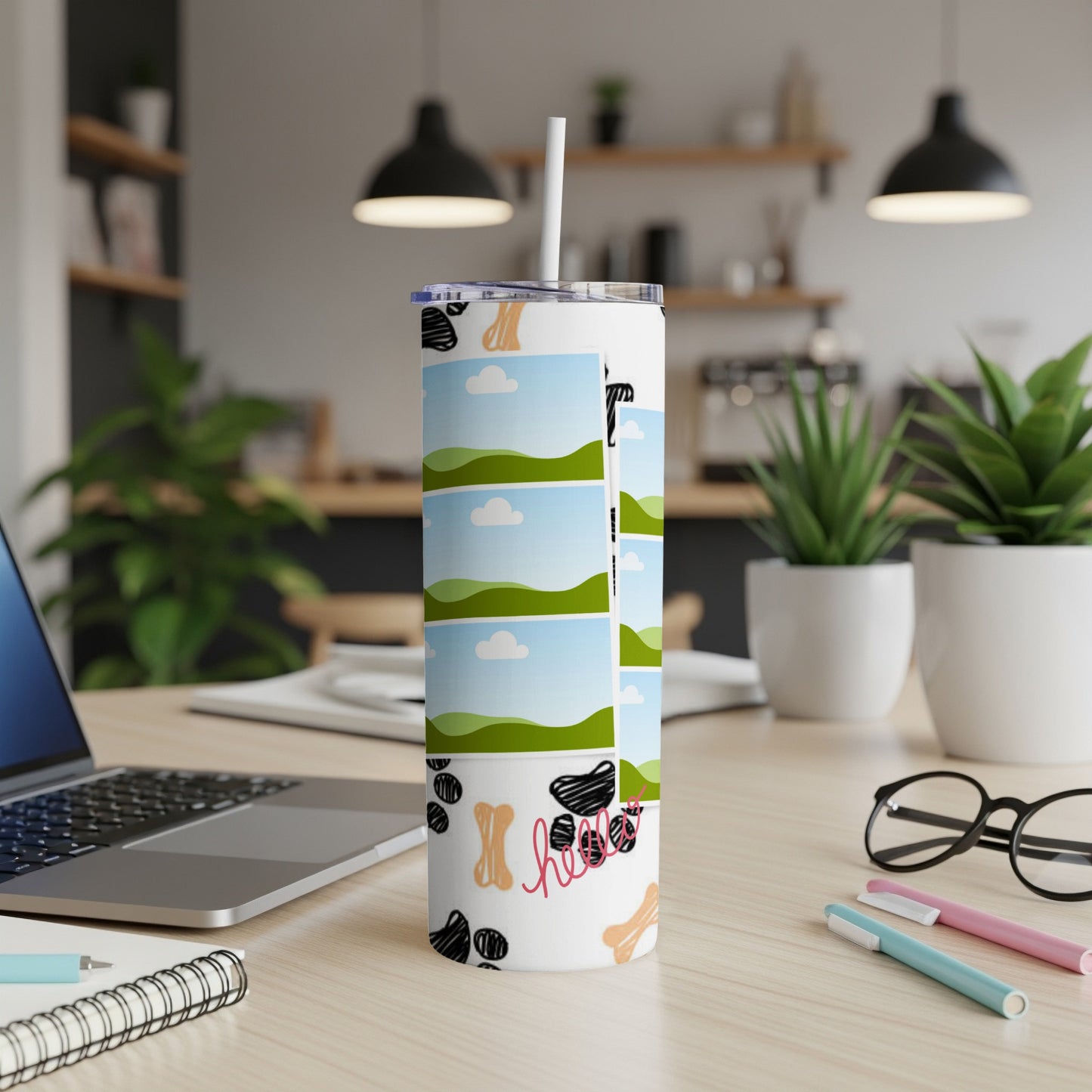 White tumbler with dog paw prints, bones, and "hello" text.