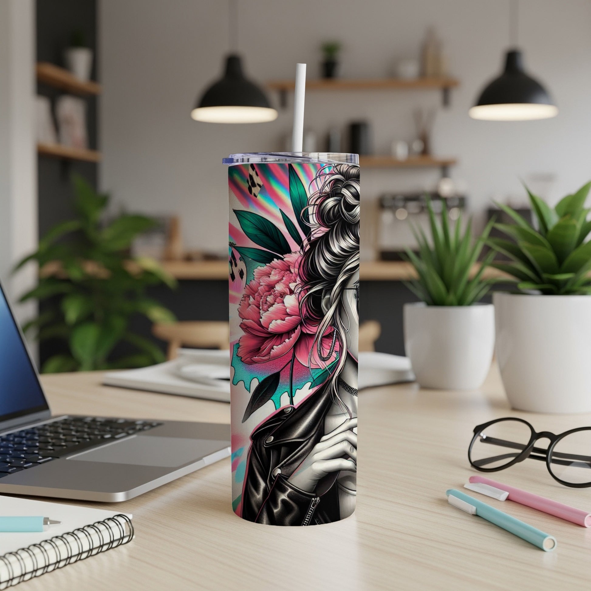 Tumbler featuring a woman with pink floral accents and a black leather jacket.