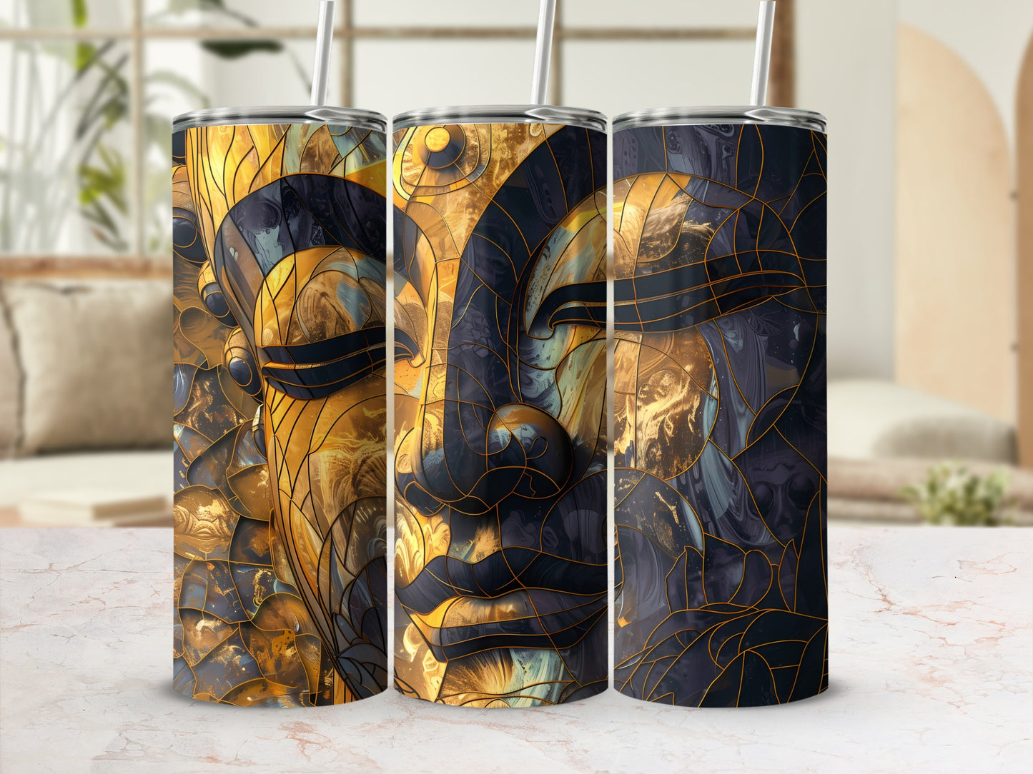 Three tumblers with stained glass Buddha face design and gold accents.