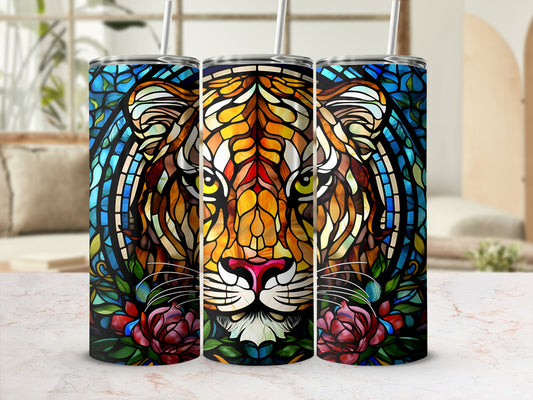 Stained glass tiger face with red roses, on three tumblers.