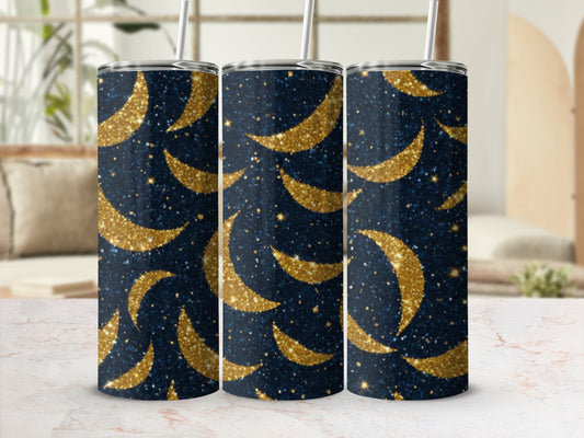 Three dark blue tumblers with golden crescent moons and stars.