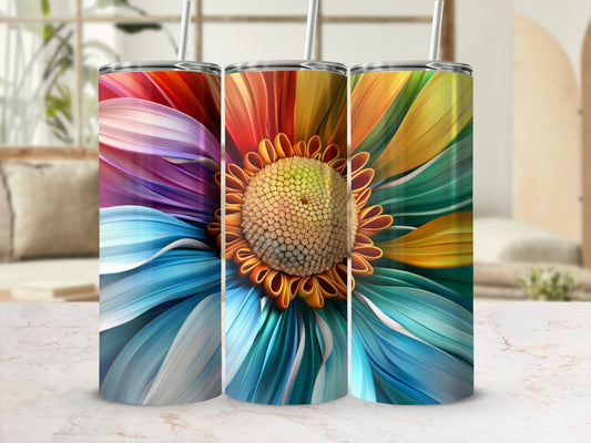 Three tumblers with colorful abstract floral designs, each with a straw.