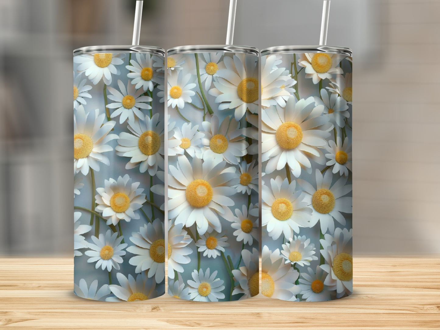 Three tumblers with a white daisy floral pattern and gray backgrounds.