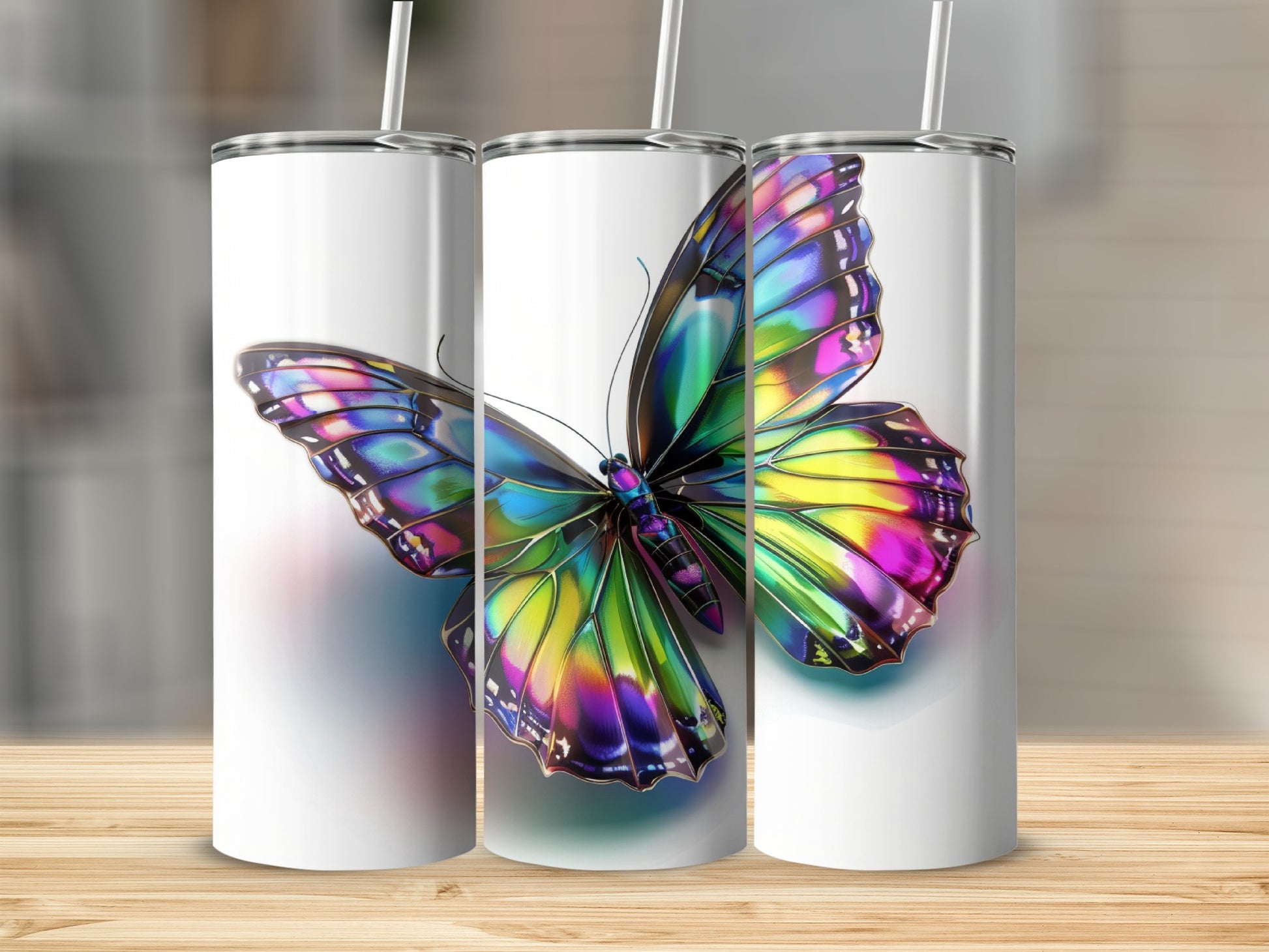 Rainbow iridescent butterfly design on a white skinny tumbler.