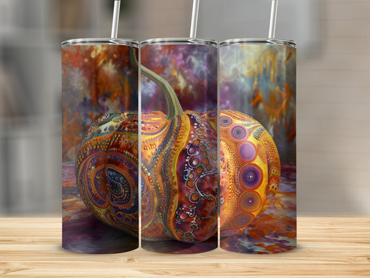 Three tumblers featuring a decorative, patterned pumpkin.
