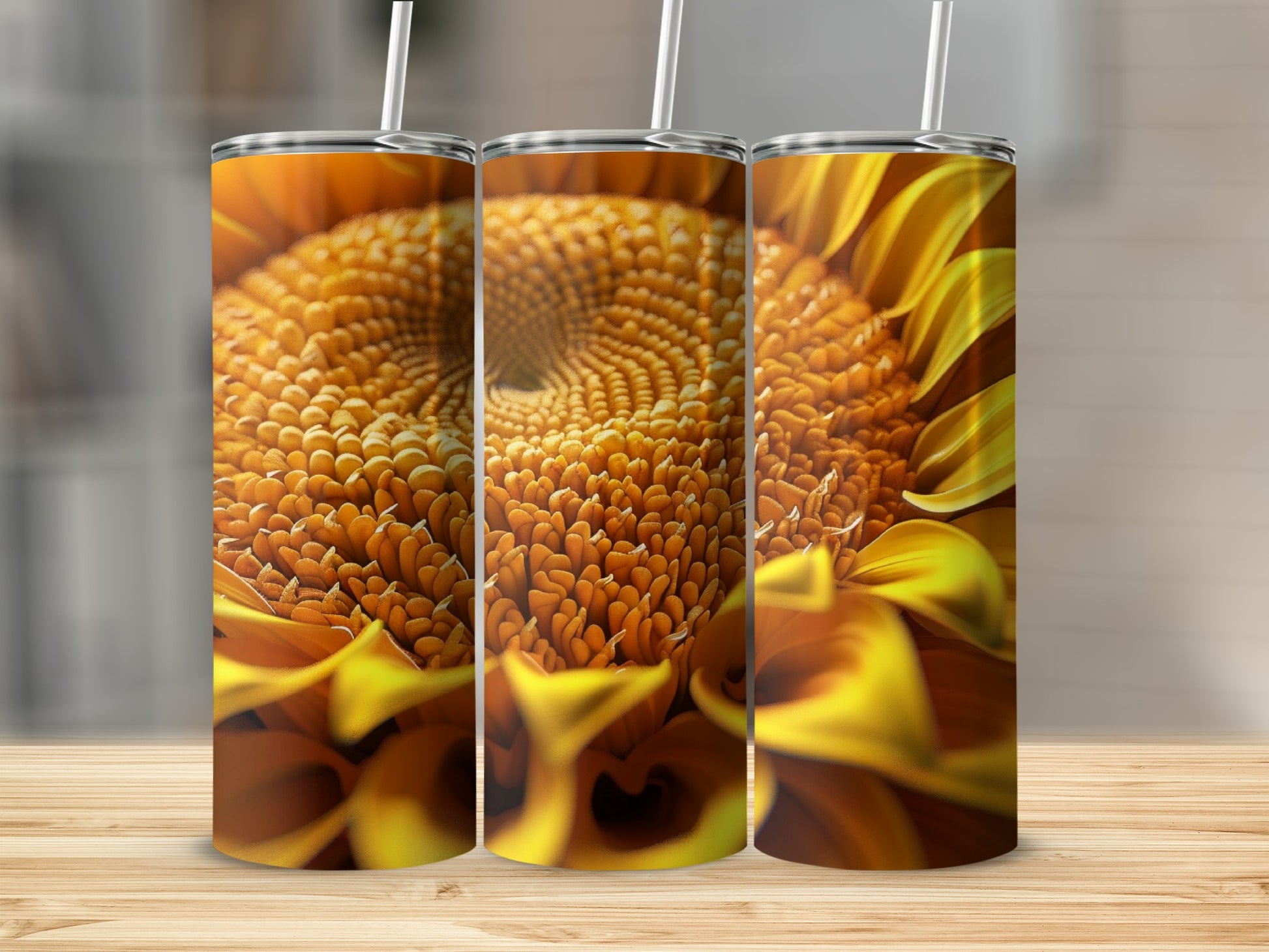 Three tumblers decorated with a close-up of a sunflower's textured center and petals.