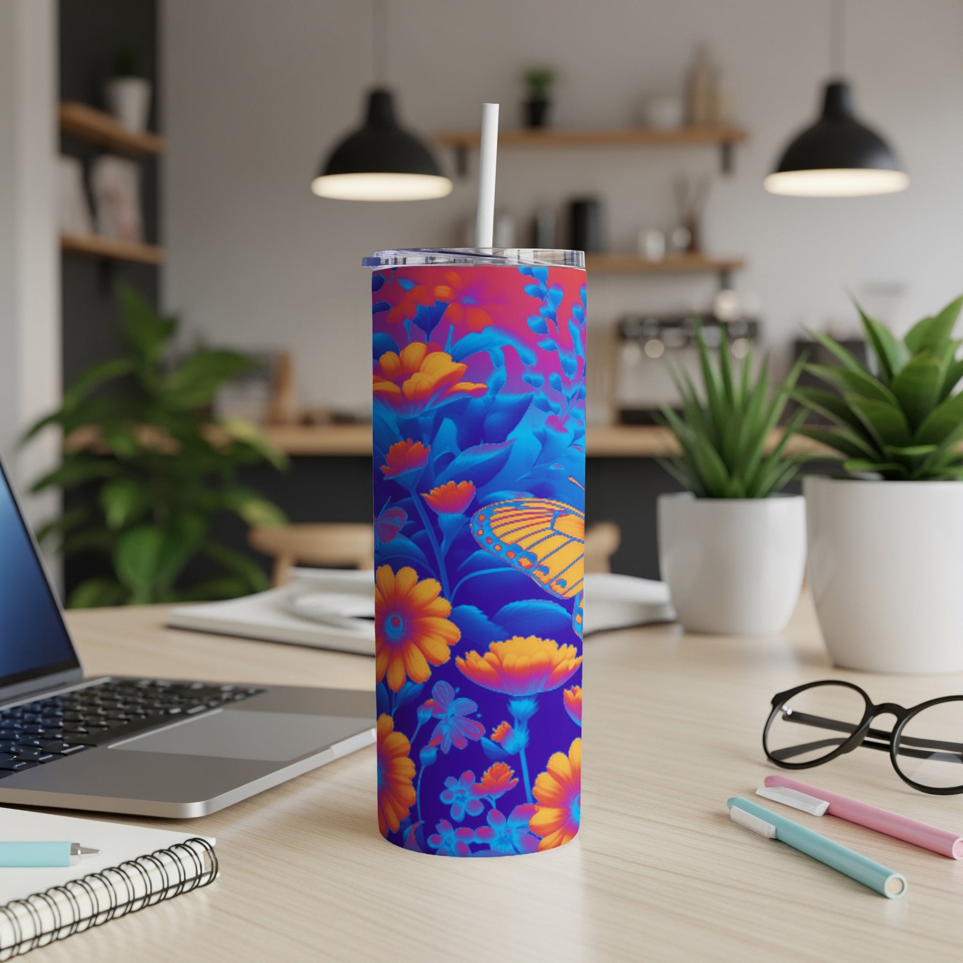 Tall tumbler with vibrant floral and butterfly design.