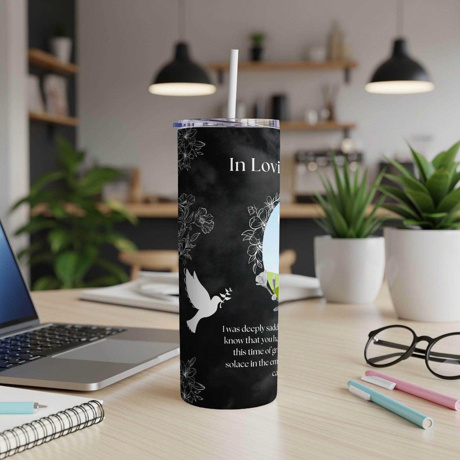 Black tumbler with "In Loving Memory" text, dove, flowers, and memorial message.